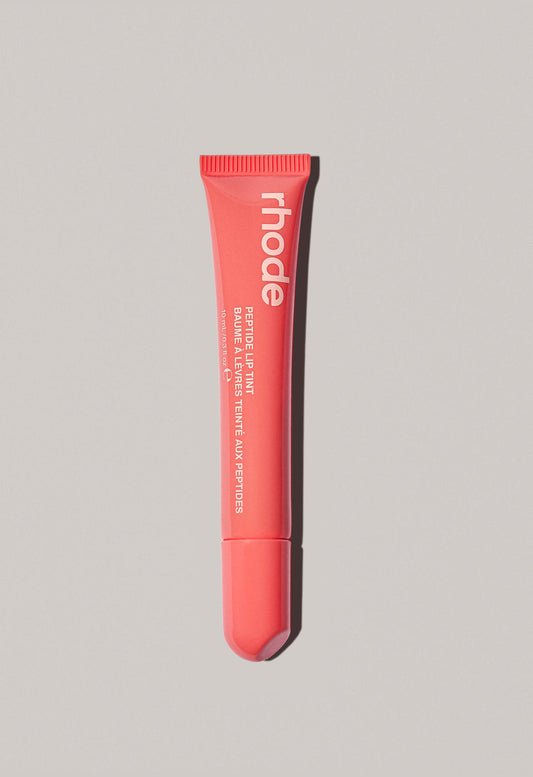 Rhode Skin’s Peptide Lip Tint (peach pit - 
neutral peach)